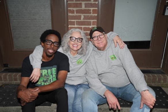 Doc, Sheri and Max on a doorstep